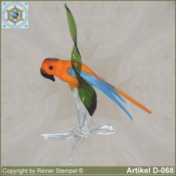 Glastiere, Glasvögel, Glasvogel Papagei auf Ast Orange